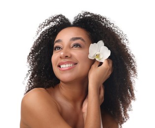 Photo of Portrait of beautiful Brazilian woman with orchid flower after spa treatment on white background