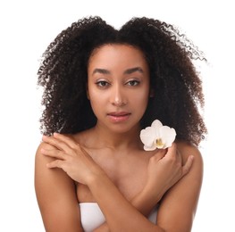 Photo of Portrait of beautiful Brazilian woman with orchid flower after spa treatment on white background