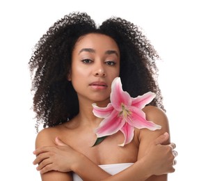 Photo of Portrait of beautiful Brazilian woman with lily flower after spa treatment on white background