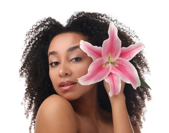 Photo of Portrait of beautiful Brazilian woman with lily flower after spa treatment on white background