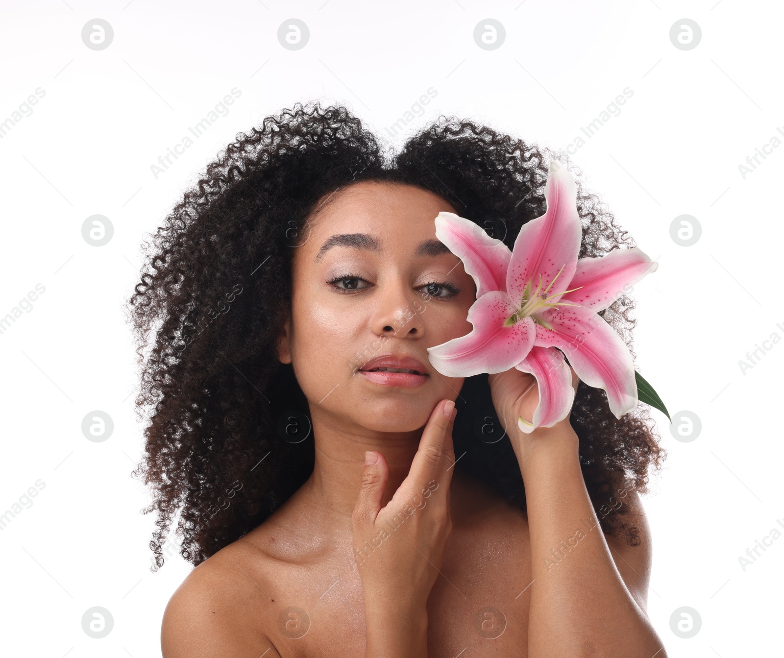 Portrait of beautiful Brazilian woman with lily flower after spa treatment on white background Photo of Portrait of beautiful Brazilian woman with lily flower after spa treatment on white background