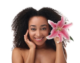 Photo of Portrait of beautiful Brazilian woman with lily flower after spa treatment on white background