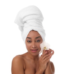 Photo of Portrait of beautiful Brazilian woman with orchid flower after spa treatment on white background