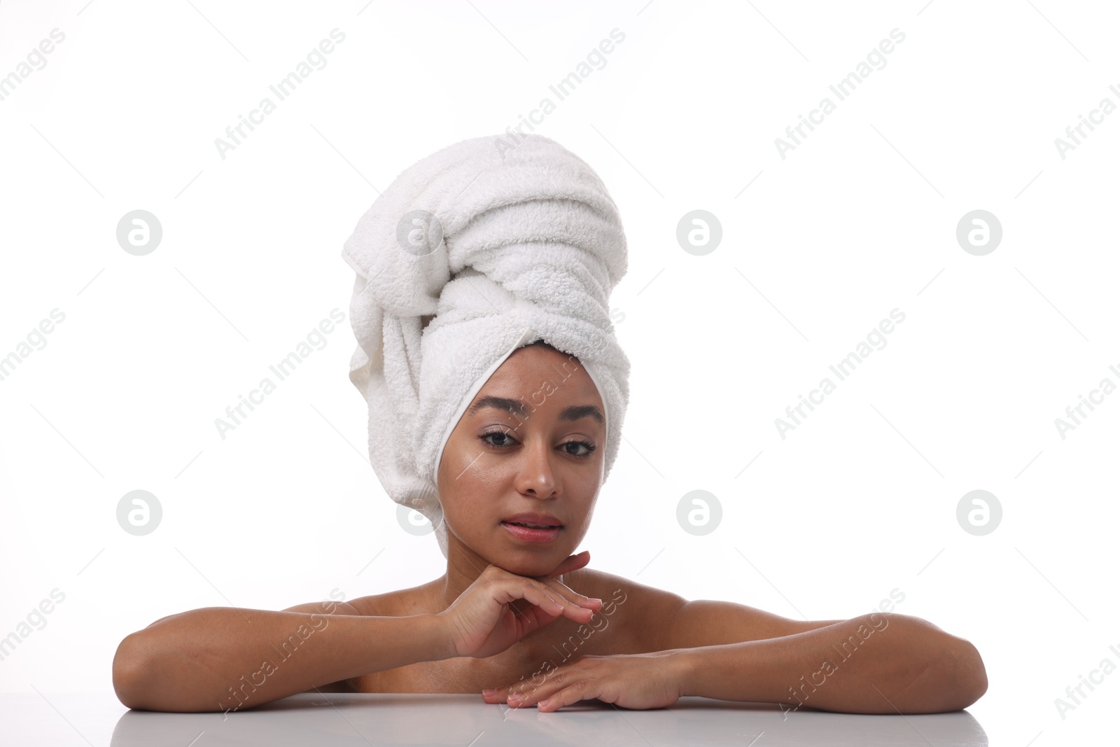 Photo of Portrait of beautiful Brazilian woman after spa treatment on white background