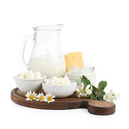 Photo of Different fresh dairy products and flowers isolated on white