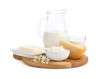 Photo of Different fresh dairy products and chamomile flowers isolated on white