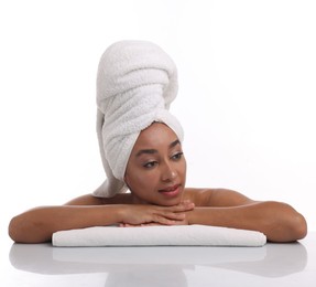 Photo of Portrait of beautiful Brazilian woman after spa treatment on white background