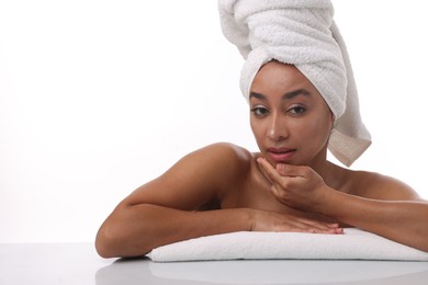 Photo of Portrait of beautiful Brazilian woman after spa treatment on white background