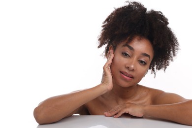 Photo of Portrait of beautiful Brazilian woman after spa treatment on white background