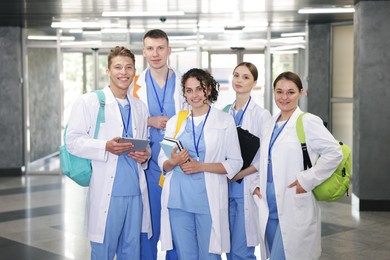 Photo of Group of medical students in uniforms indoors