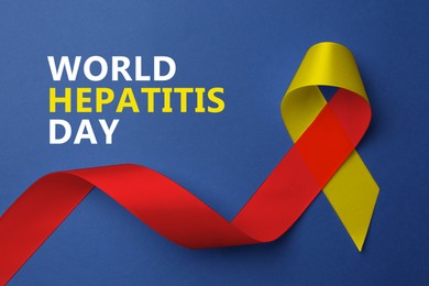 Image of 28th july World Hepatitis Day. Yellow-red awareness ribbon on blue background, top view