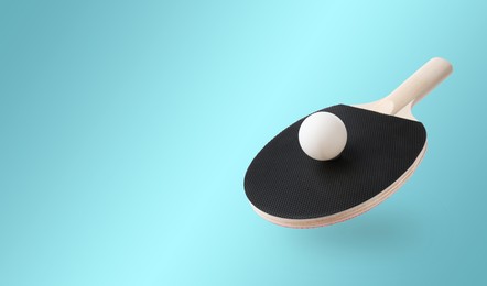 Image of Ping pong racket and ball in air against light blue background. Banner design with space for text