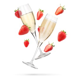 Image of Sparkling wine in glasses and fresh strawberries falling against white background