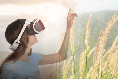 Image of Happy woman using virtual reality headset, multiple exposure with mountain landscapes