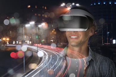 Image of Happy man using virtual reality headset, double exposure with cityscape