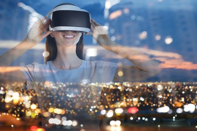 Image of Happy woman using virtual reality headset, multiple exposure with cityscapes