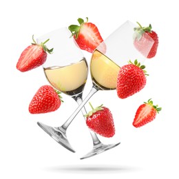 Image of Wine in glasses and fresh strawberries falling against white background