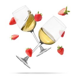Image of Wine in glasses and fresh strawberries falling against white background