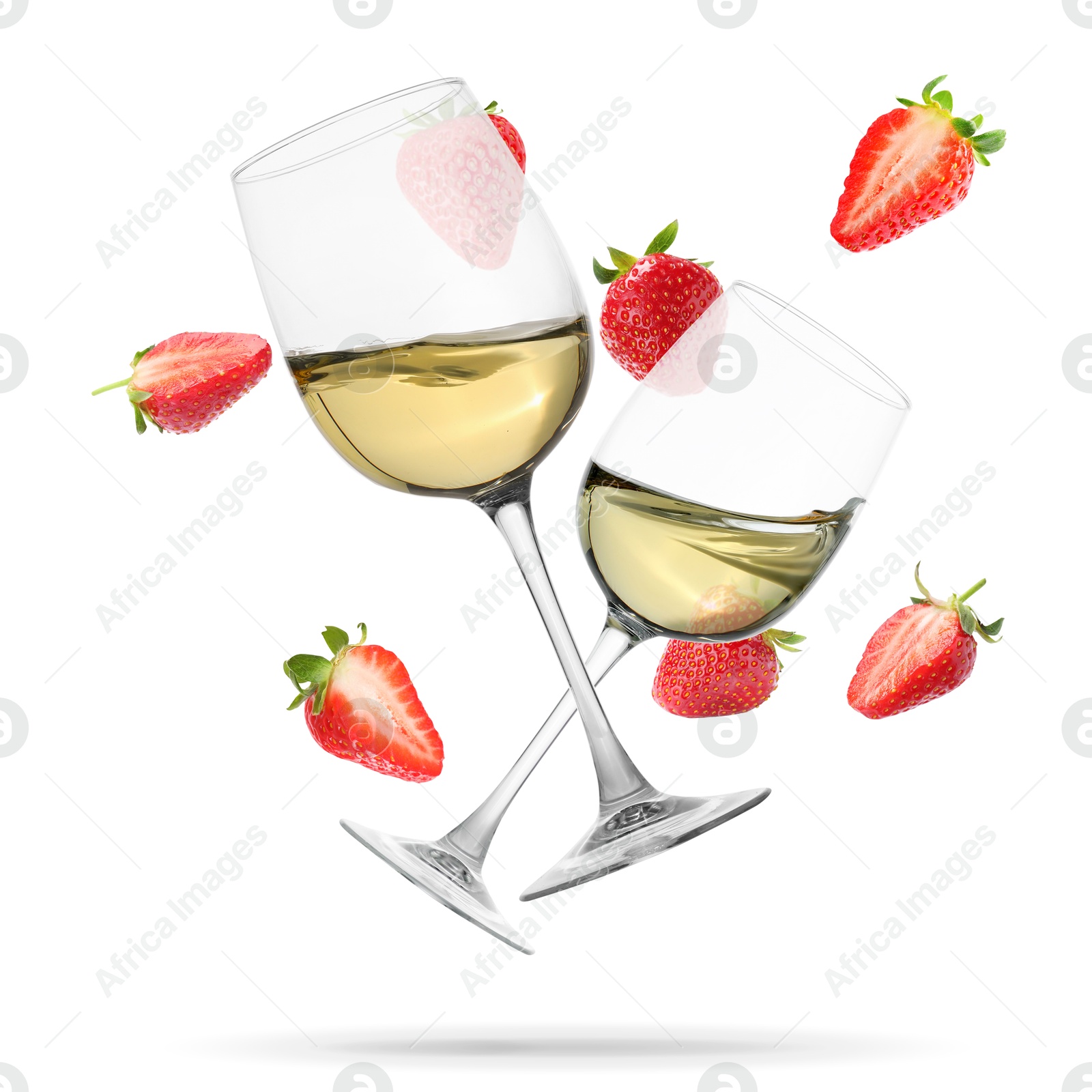 Image of Wine in glasses and fresh strawberries falling against white background