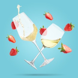 Image of Wine in glasses and fresh strawberries falling against light blue background