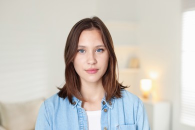 Photo of Portrait of beautiful teenage girl at home