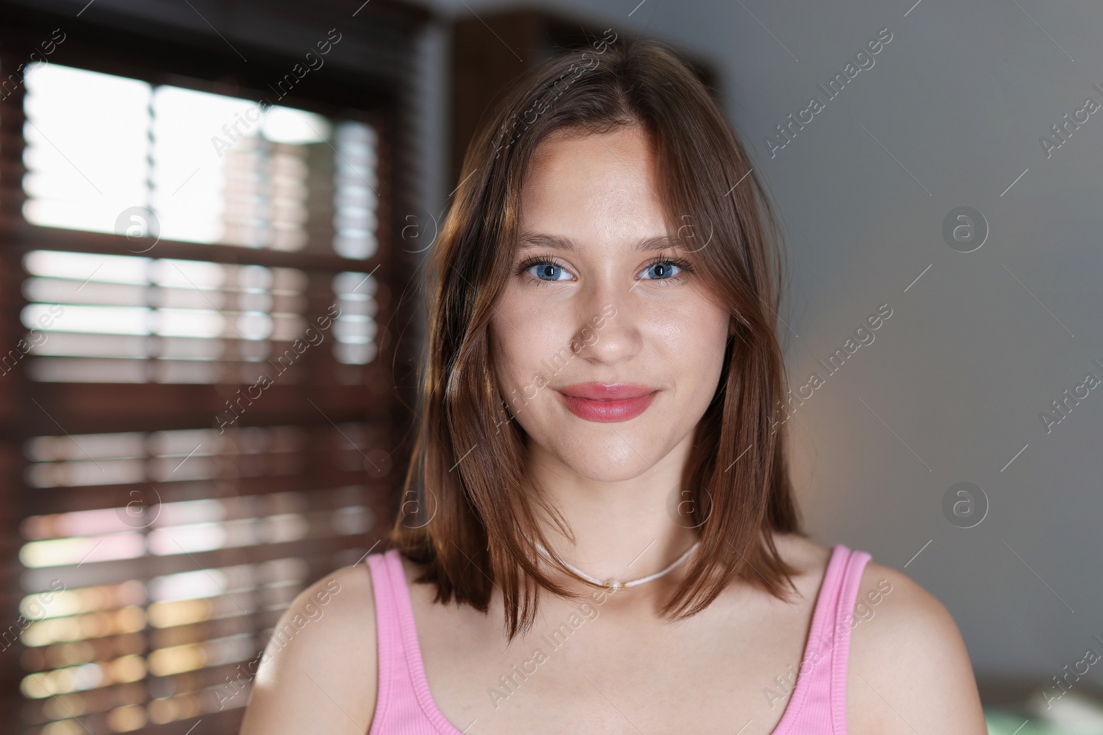 Portrait of beautiful teenage girl at home Photo of Portrait of beautiful teenage girl at home