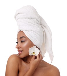 Photo of Portrait of beautiful Brazilian woman with orchid flower after spa treatment on white background