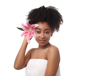 Photo of Portrait of beautiful Brazilian woman with lily flower after spa treatment on white background