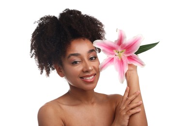 Photo of Portrait of beautiful Brazilian woman with lily flower after spa treatment on white background