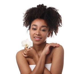 Photo of Portrait of beautiful Brazilian woman with orchid flower after spa treatment on white background
