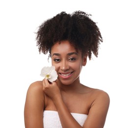 Photo of Portrait of beautiful Brazilian woman with orchid flower after spa treatment on white background