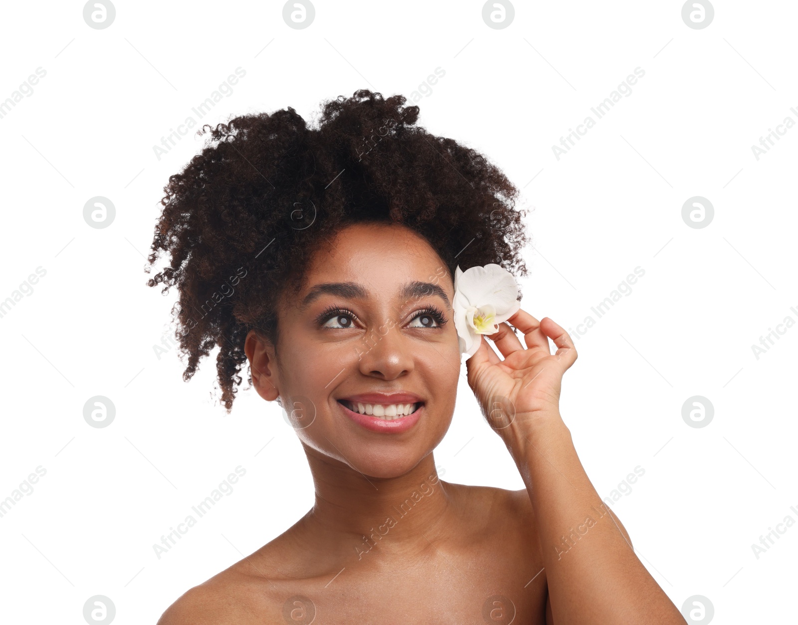Photo of Portrait of beautiful Brazilian woman with orchid flower after spa treatment on white background