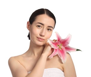 Photo of Portrait of beautiful woman with lily flower after spa treatment on white background