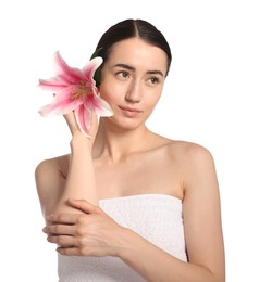Photo of Beautiful woman with lily flower after spa treatment on white background