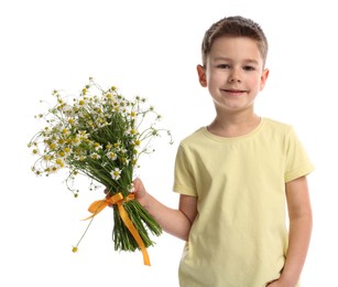 Photo of Cute little boy with bouquet of beautiful chamomile flowers on white background