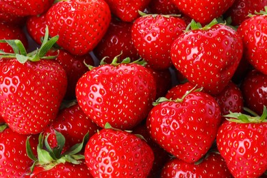 Photo of Fresh ripe strawberries as background, top view