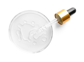Photo of Cosmetic product and dropper in Petri dish on white background, top view