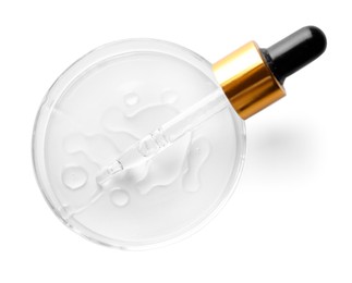 Photo of Cosmetic product and dropper in Petri dish on white background, top view