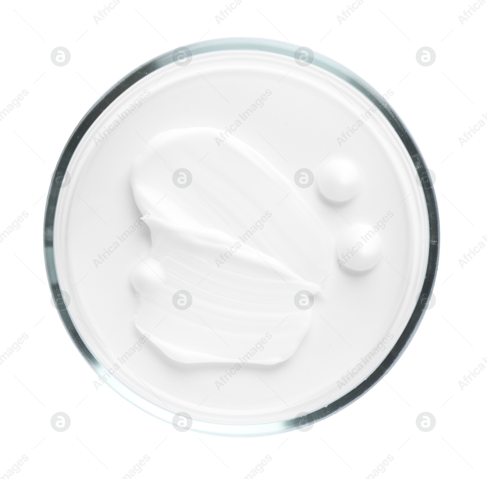 Cosmetic product in Petri dish isolated on white, top view Photo of Cosmetic product in Petri dish isolated on white, top view