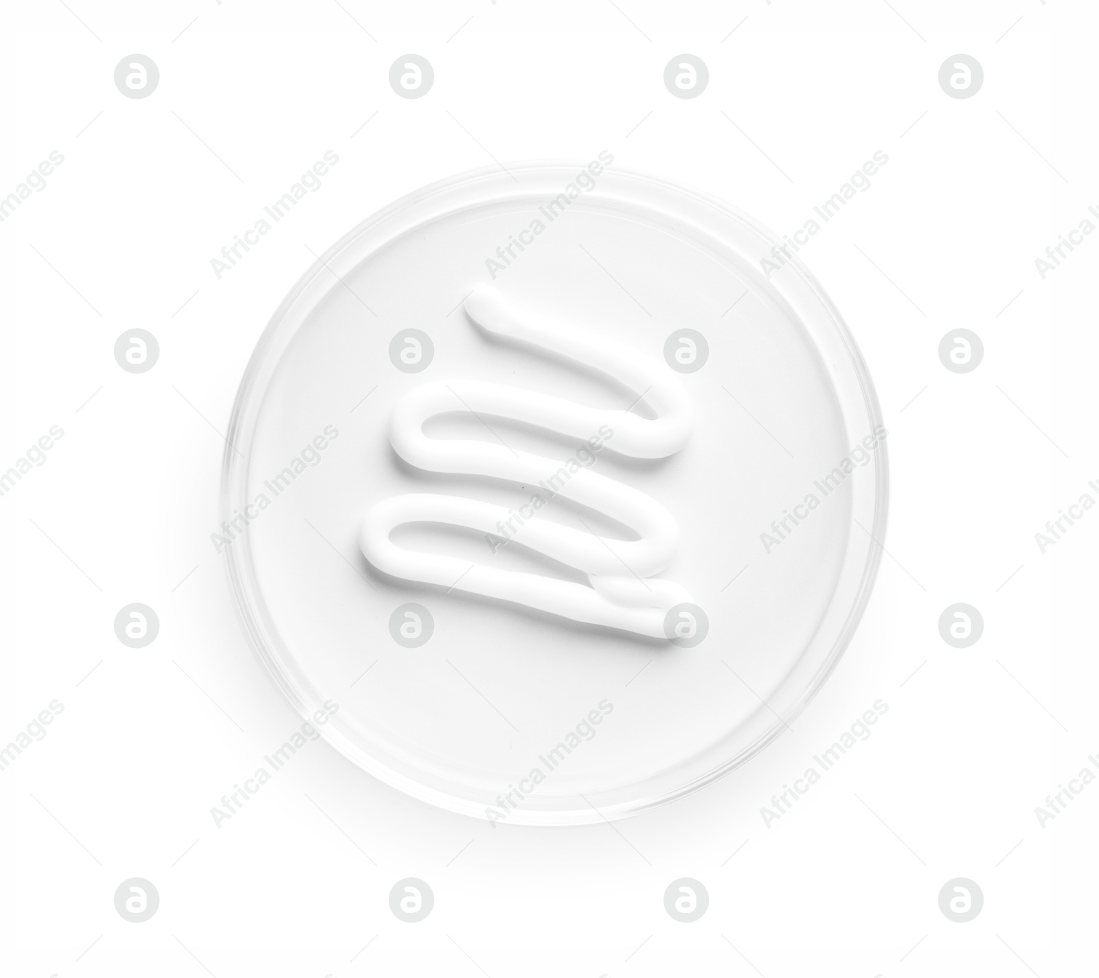 Cosmetic product in Petri dish isolated on white, top view Photo of Cosmetic product in Petri dish isolated on white, top view