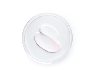 Photo of Cosmetic product in Petri dish isolated on white, top view