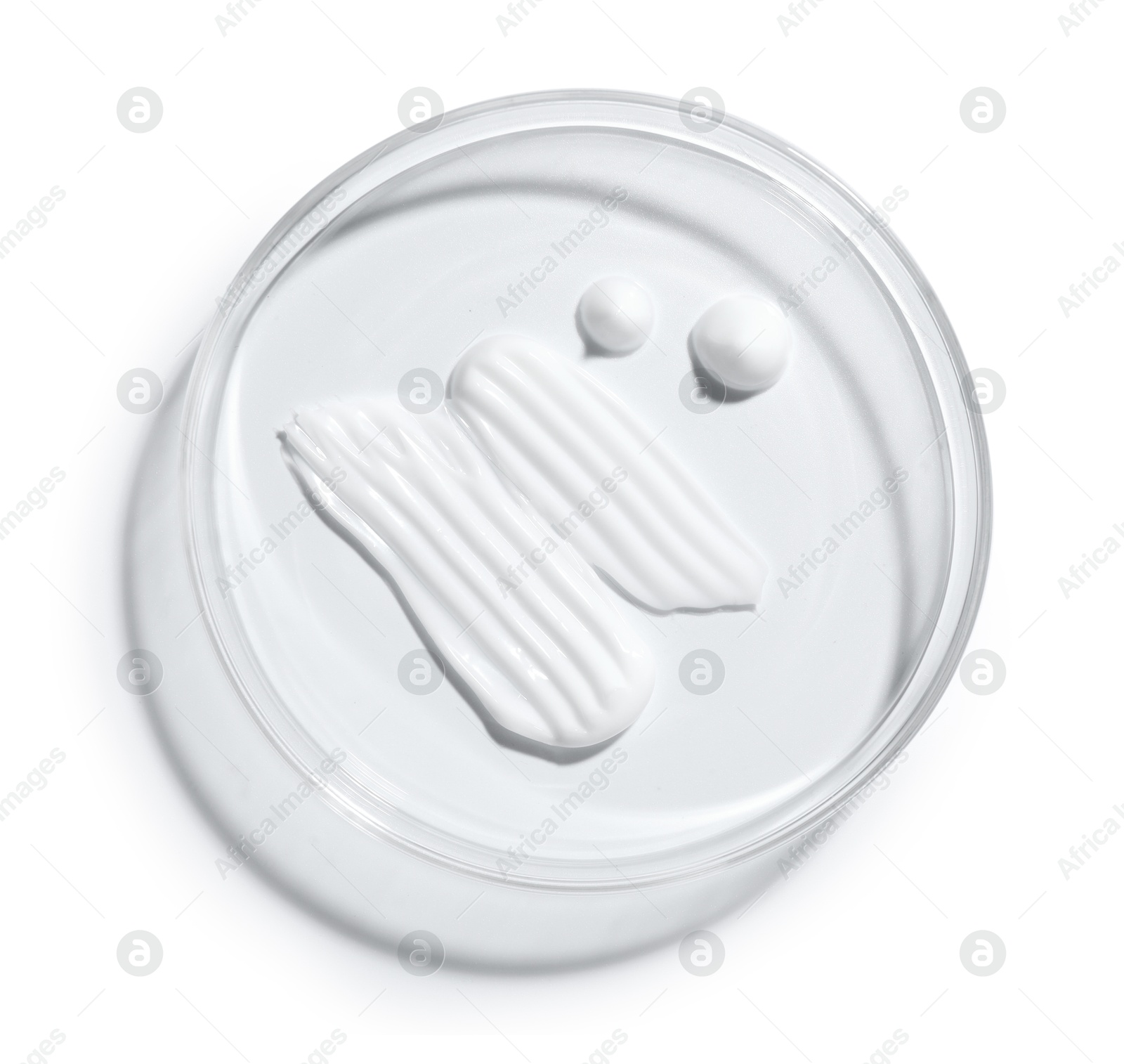 Cosmetic product in Petri dish isolated on white, top view Photo of Cosmetic product in Petri dish isolated on white, top view