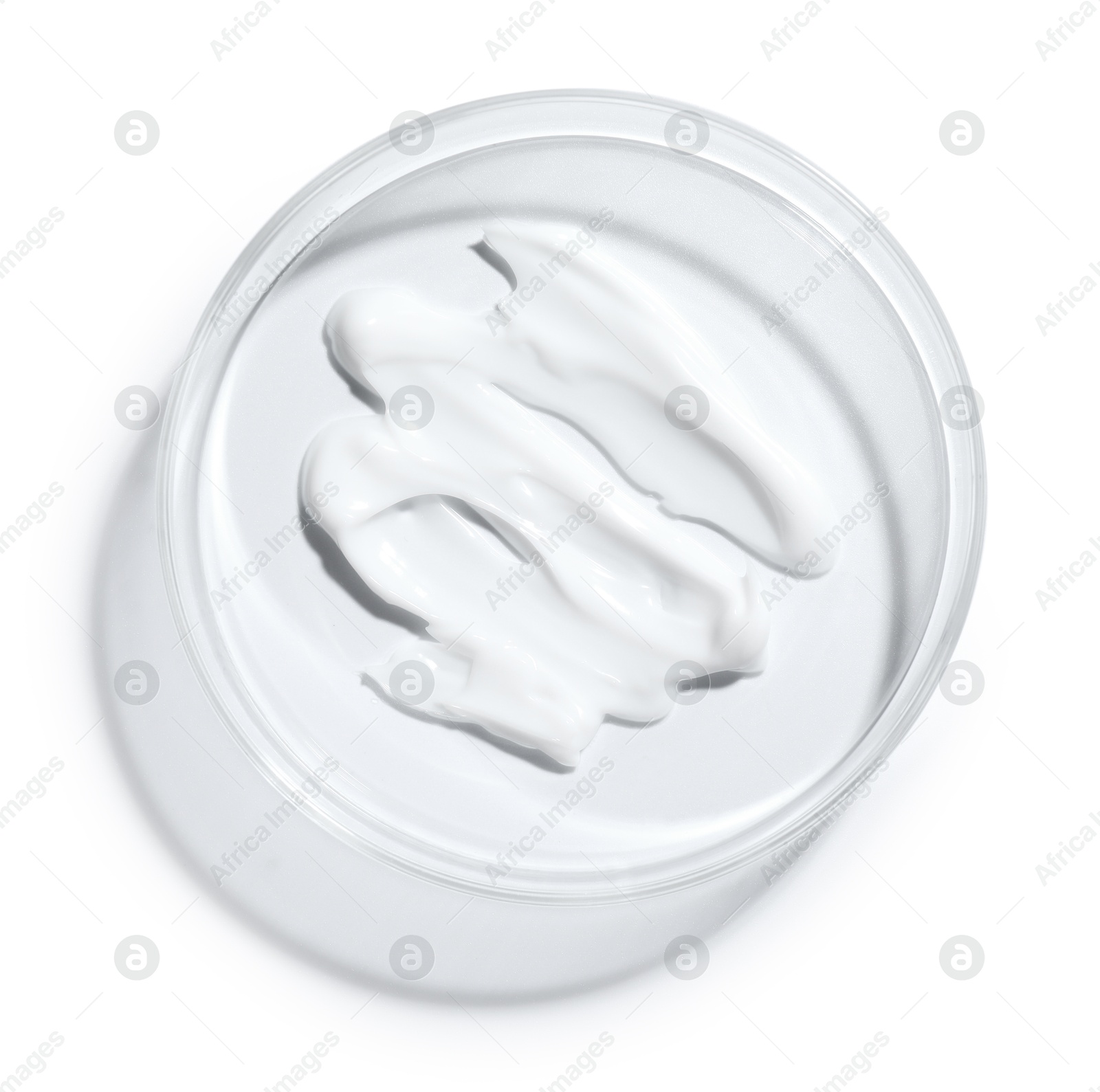 Cosmetic product in Petri dish isolated on white, top view Photo of Cosmetic product in Petri dish isolated on white, top view