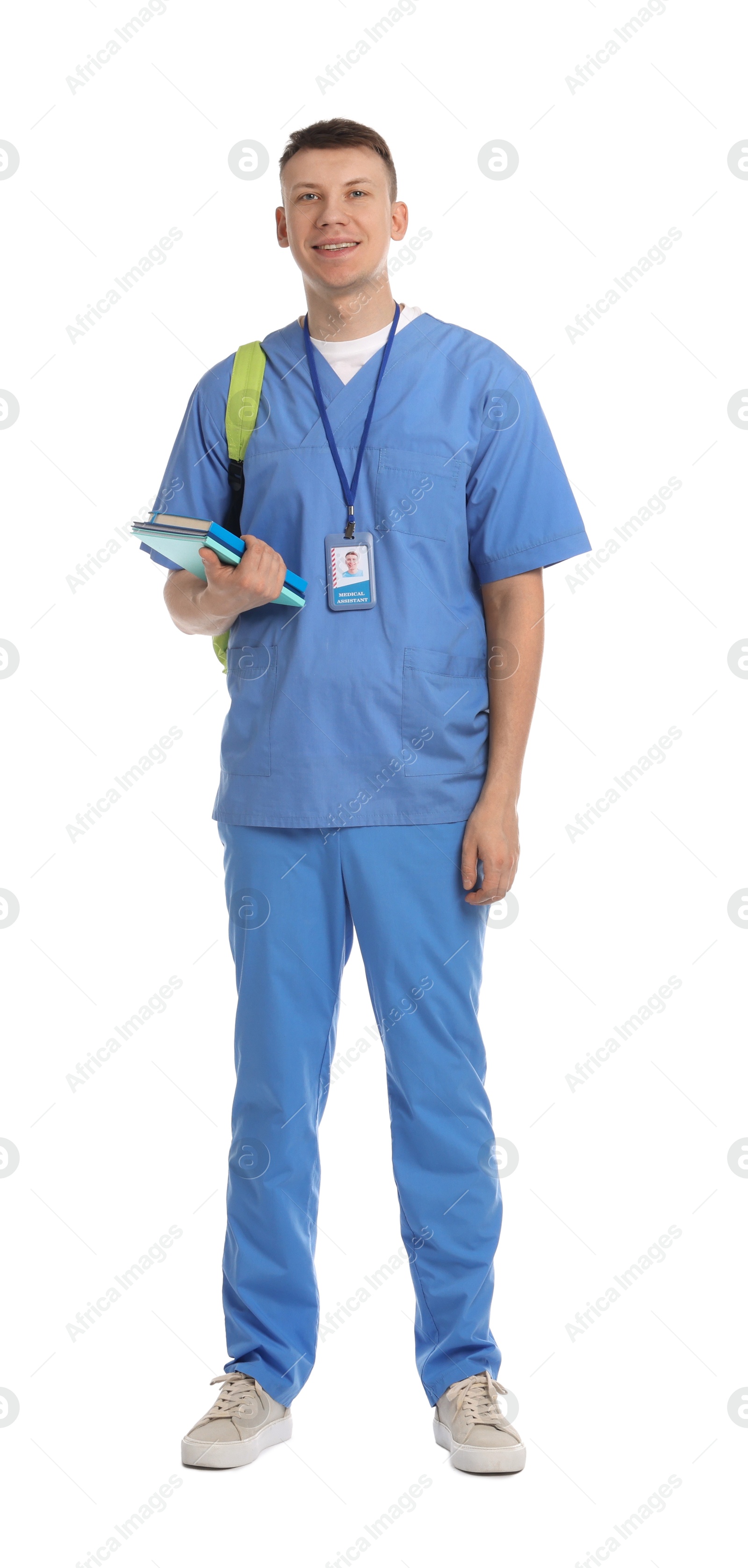 Medical student with books on white background Photo of Medical student with books on white background