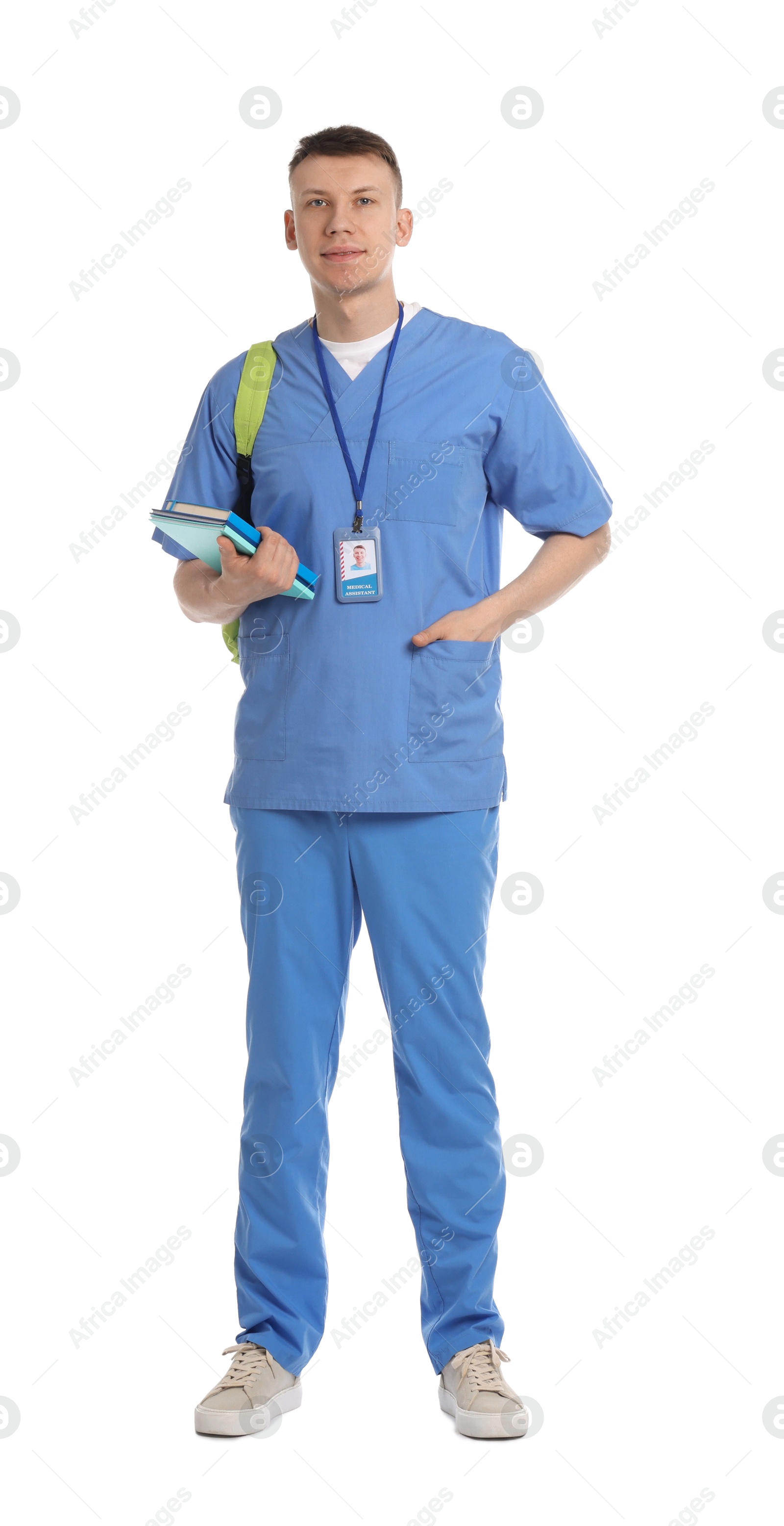 Photo of Medical student with books on white background