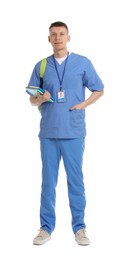 Photo of Medical student with books on white background