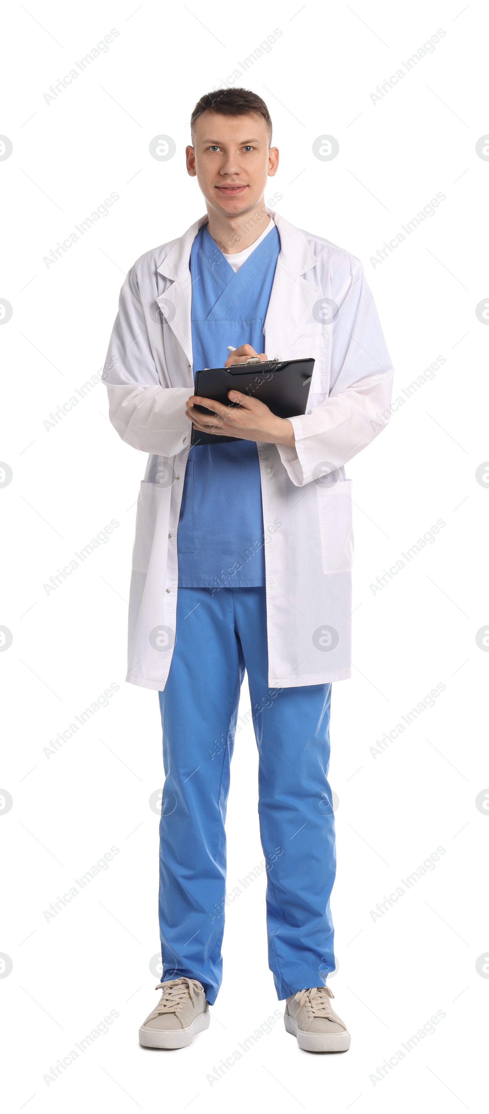 Medical student with clipboard on white background Photo of Medical student with clipboard on white background