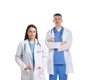 Photo of Medical students in coats on white background