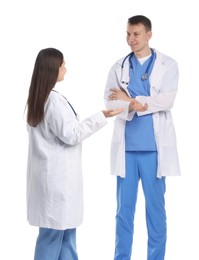 Photo of Medical students in coats on white background