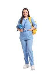 Photo of Medical student with books on white background
